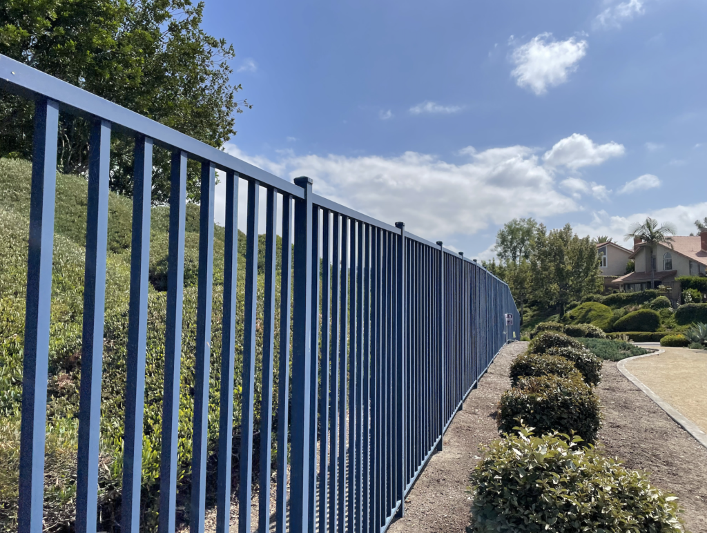Blue aluminum fence for perimeter of large property