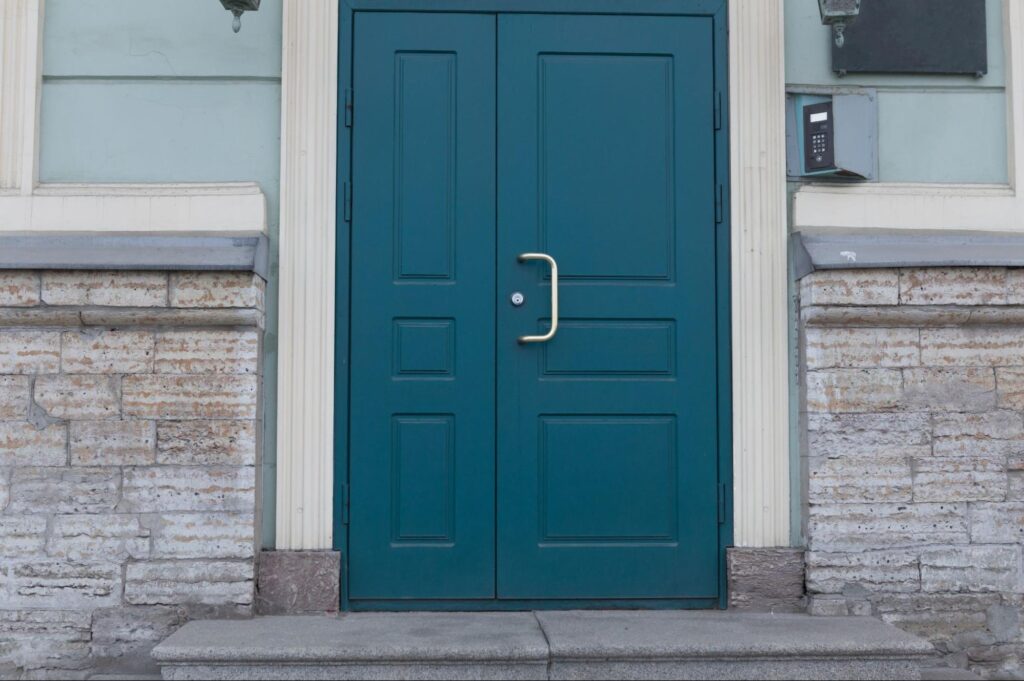 Utility doors of a brick structure.