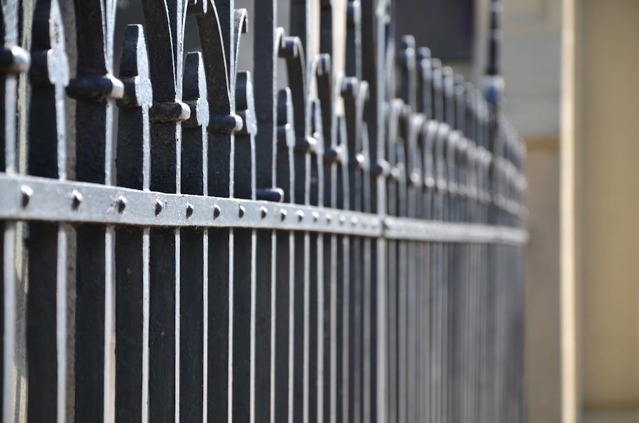 A side view of an aluminium fence.