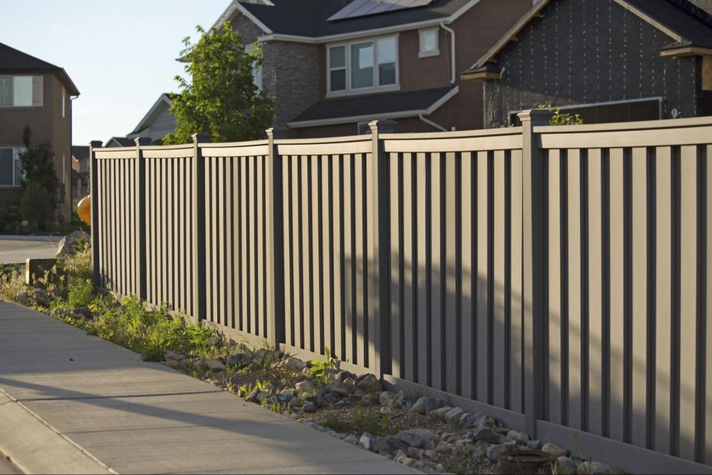 How to Maintain Your Wood Grain Vinyl Fence Year-Round